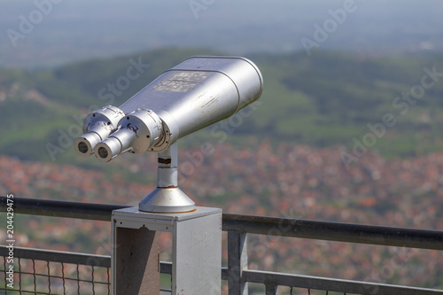 Tourist binocular on the top of mountain Bukulja photo