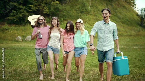 Happy Friends Having Fun Outdoors In Nature.