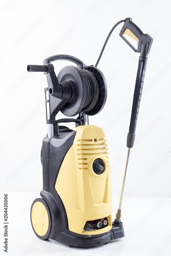 Fototapeta premium Yellow high pressure washer on white background