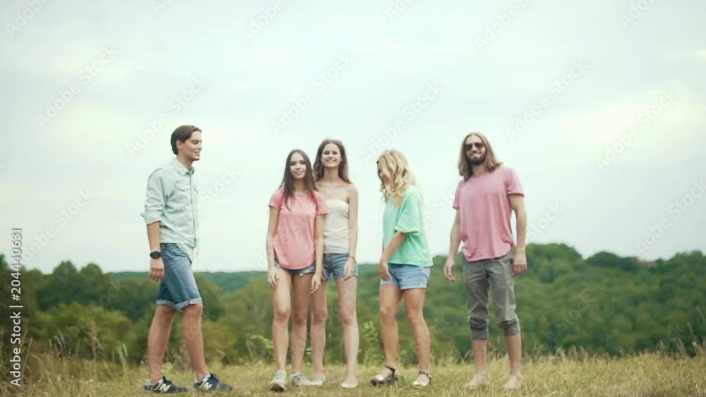 People Jumping Outdoors. Group Of Friends Having Fun In Nature People Jumping Outdoors. Group Of Friends Having Fun In Nature
