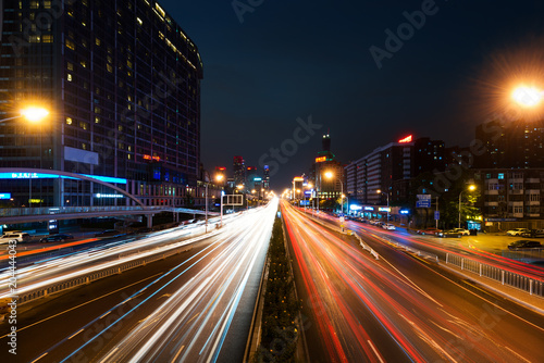Light trails on the street at Beijing Central Business district at night in Beijing ,China. © ake1150