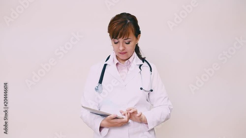 woman doctor in the hospital with the Tablet photo