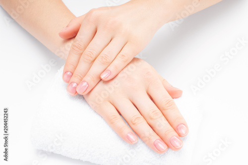 Beautiful woman  hands. Spa and manicure. Soft skin, the concept of nail care.
