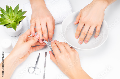 Hands care in the spa. Beautiful woman's hands with perfect manicure