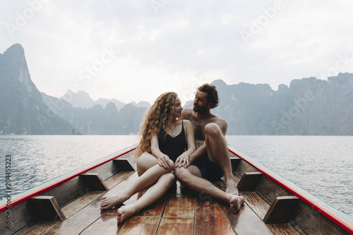 Couple boating on a quiet lake
