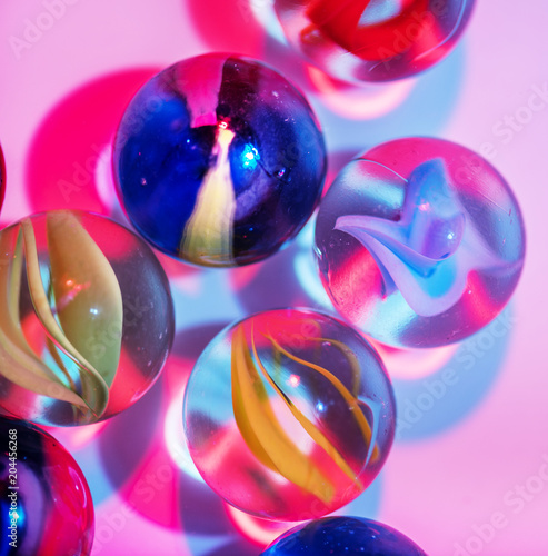 Closeup shot of glass marbles photo