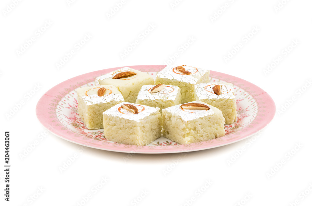 Indian Sweet Food Badam Barfi Also Know As Mithai, barfee, Mawa Barfi, Mava barfi, Almond Sweet, khoya Burfi Indian Popular Sweet Made up of Coconut, Mawa, Milk and Sugar isolated on white background Indian Sweet Food Badam Barfi Also Know As Mithai, barfee, Mawa Barfi, Mava barfi, Almond Sweet, khoya Burfi Indian Popular Sweet Made up of Coconut, Mawa, Milk and Sugar isolated on white background