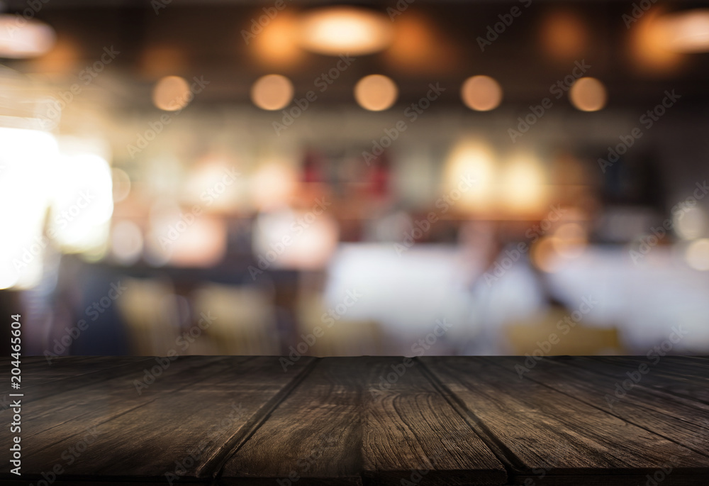 Wooden board empty table cafe, coffee shop, bar blurred background can be used for display or montage your products and Mock up Wooden board empty table cafe, coffee shop, bar blurred background can be used for display or montage your products and Mock up