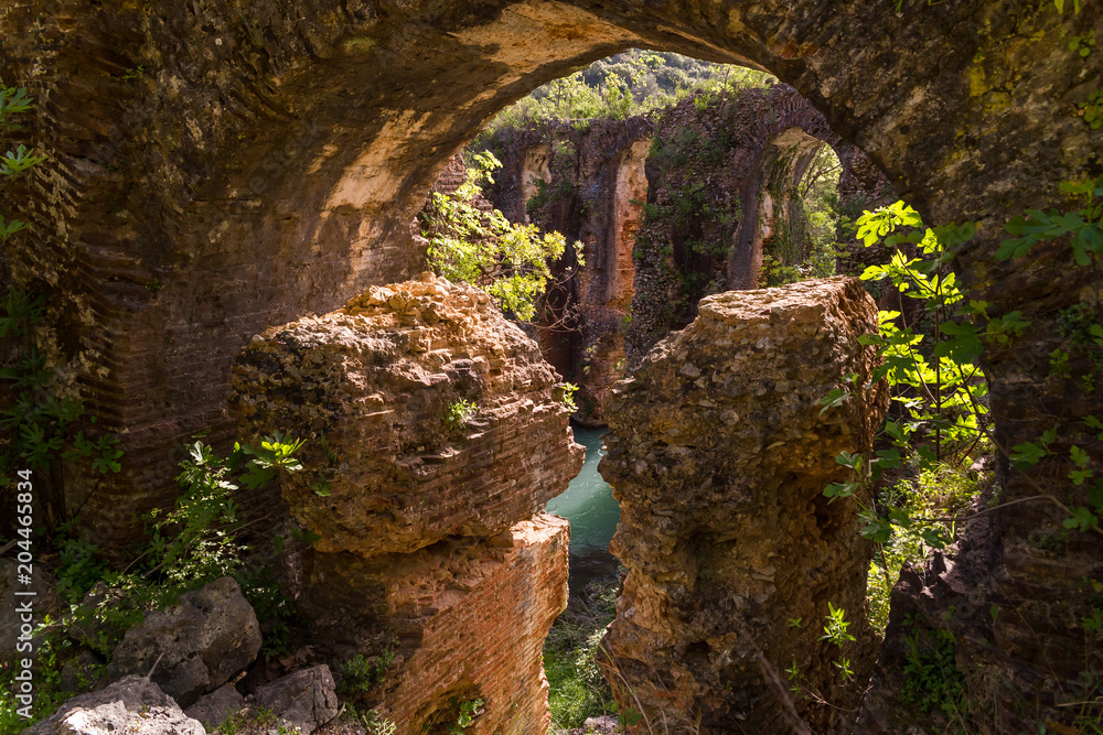 Roman aqueduct of ancient Nikopolis starts from the northern end of the valley of the Louros, near the village of St. George, north of Filippiada, Preveza, Greece