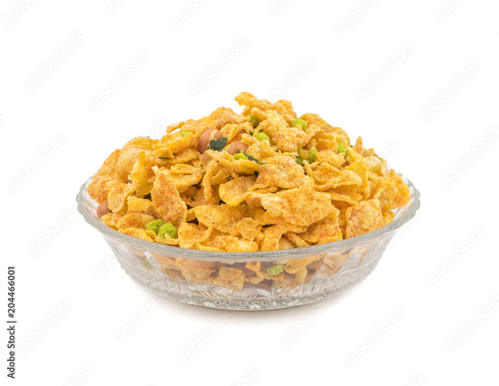 Indian Deep Fried Salty Dish Namkeen Called Namkin, Nimco, Chivda, Mixture or Farsan made of gram flour and mixed with dry fruits isolated on white background Indian Deep Fried Salty Dish Namkeen Called Namkin, Nimco, Chivda, Mixture or Farsan made of gram flour and mixed with dry fruits isolated on white background