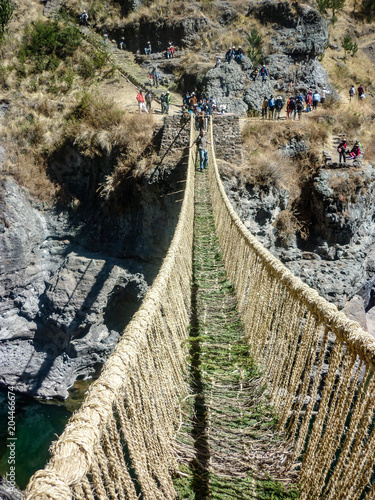 Q'eswachaca, a bridge made of grass, hanging over the Apurimac river, Quehue, Cusco, Peru photo
