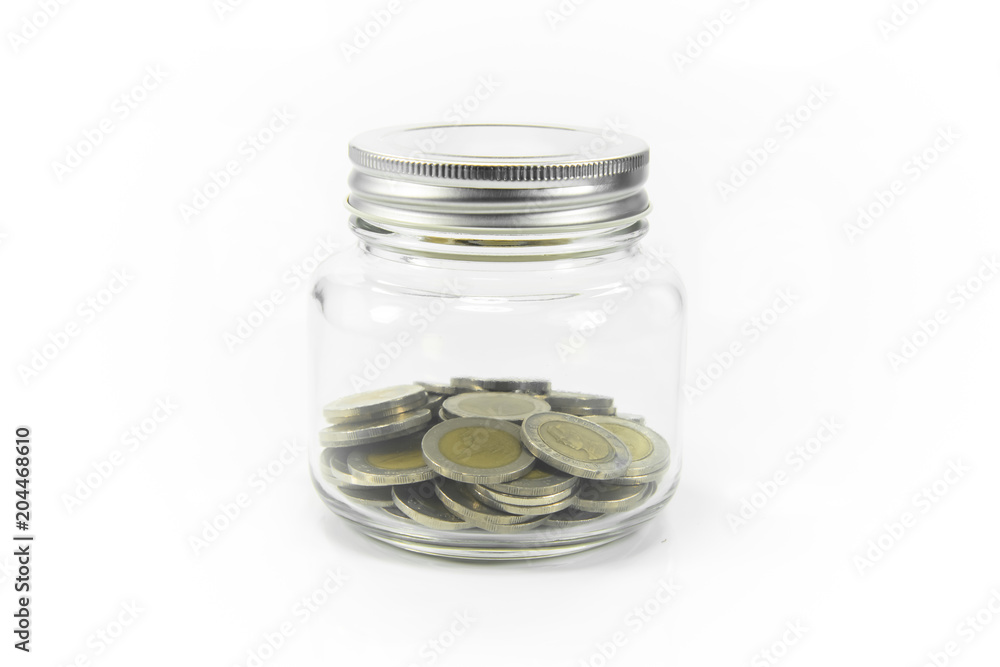 Saving money in a jar clear for the future. Saving money in a jar clear for the future.