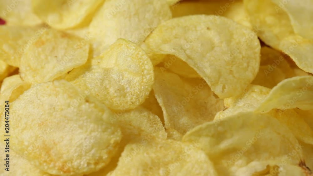 Close up of rotating potato chips. No sound. Close up of rotating potato chips. No sound.