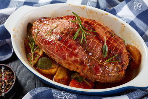 Photos meat roulade roasted in cooking net