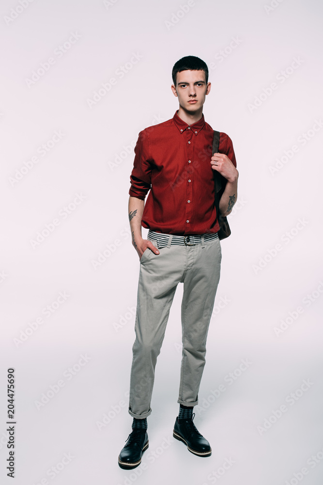 Hipster young man in red shirt on white background Hipster young man in red shirt on white background