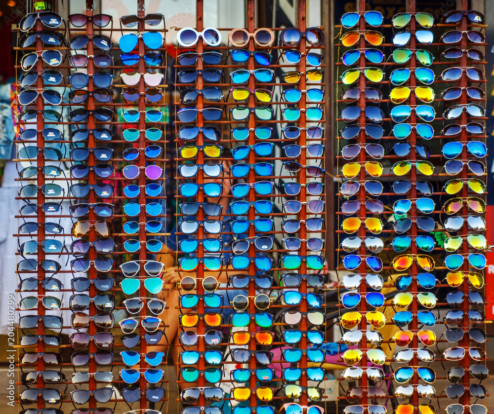 Outdoor showcase with a variety of sunglasses for eye protection.