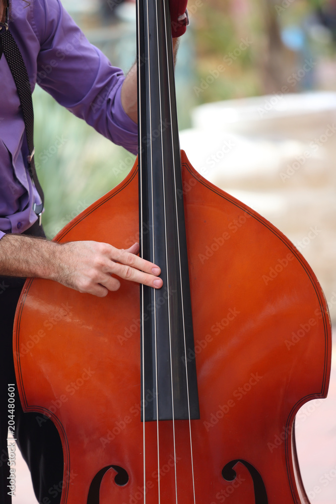 Street musicians play jazz on the town square
Street musicians play jazz on the town square