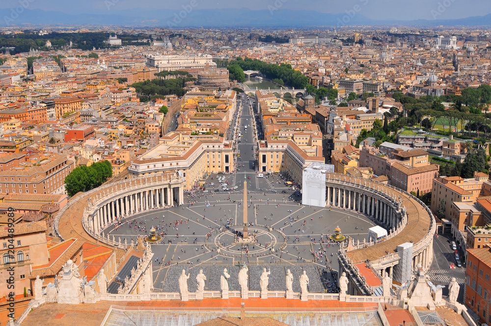 Saint Peter's Square in Vatican and aerial view of the Rome city, Italy.