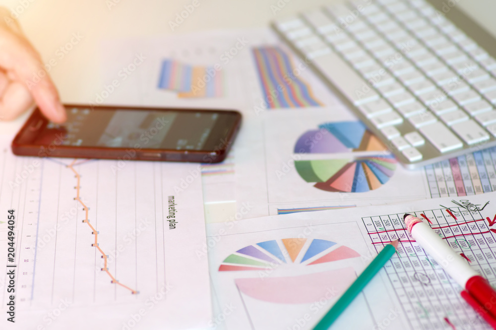 Workflow of the marketer. Work on the analysis of the marketing plan. Graphs, charts of sales results. Workflow of the marketer. Work on the analysis of the marketing plan. Graphs, charts of sales results.