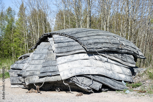 Blasting mat. Old used heavy blasting mats in a pile. photo