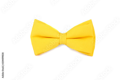 Bright yellow bowtie on a white background.