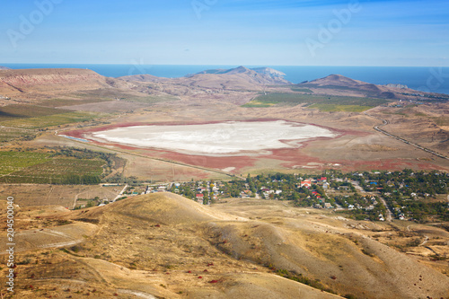 Crimea, view from Mount Klementyev to vineyards and salt lake Barakol