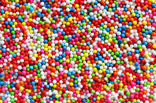 close up of colorful sprinkle sugar background. © sakhorn38
