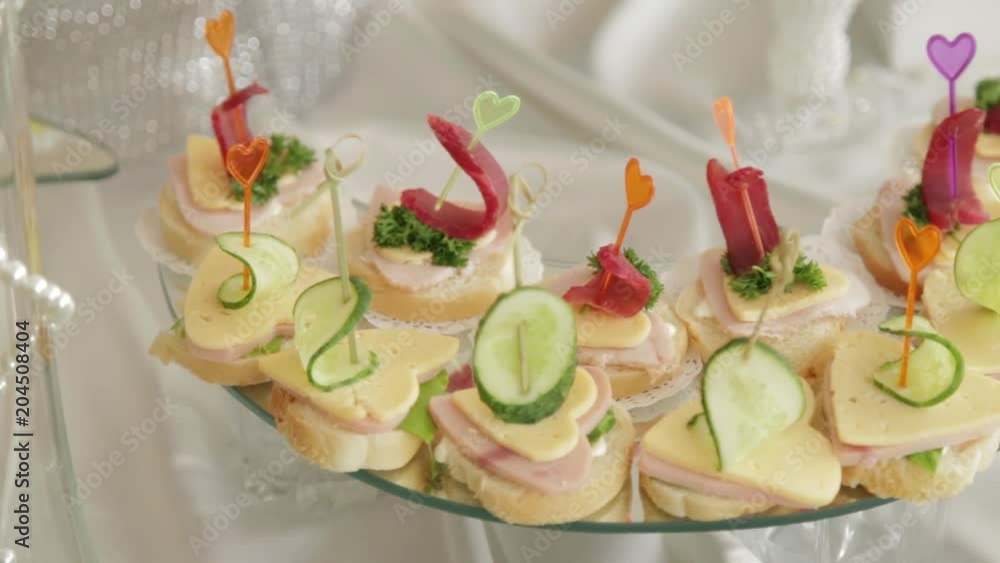 Furshet. The countertop is full of sparkling white wine glasses with canapés and antipasti in the background. snack hd Furshet. The countertop is full of sparkling white wine glasses with canapés and antipasti in the background. snack hd