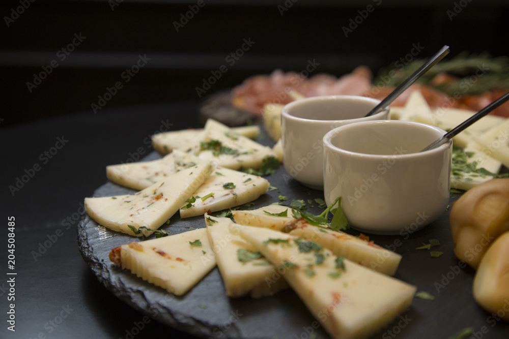 Traditional italian aperitif with proscioutto, mortadella sausage, cheese and aperol spritz drink Traditional italian aperitif with proscioutto, mortadella sausage, cheese and aperol spritz drink