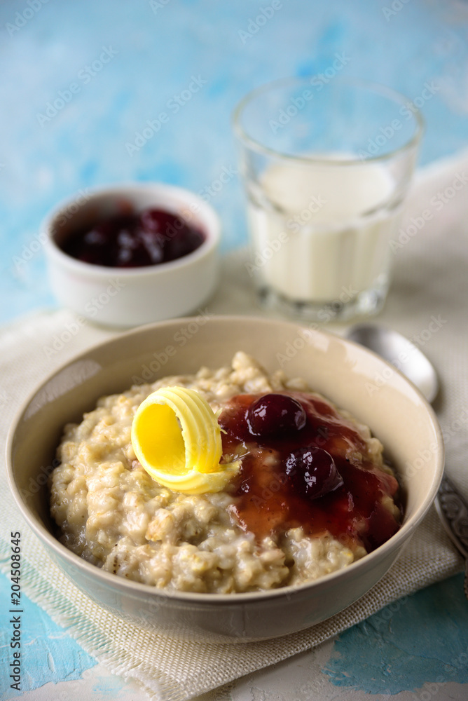 Oatmeal porridge with butter and cherry jam Oatmeal porridge with butter and cherry jam