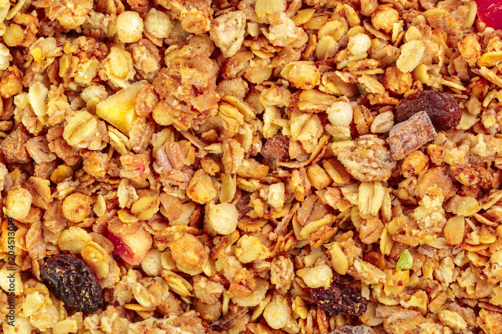 Homemade roasted granola on baking sheet breakfast food background Homemade roasted granola on baking sheet breakfast food background