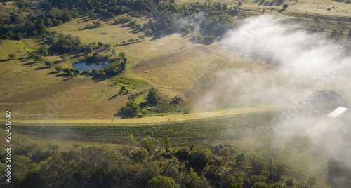 Aerial drone view of a foggy morning in the Scenic Rim, Queensland, Australia © Melanie