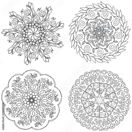 A set of black and white mandalas. Decorative round ornaments. Wicker design elements. Logos for yoga  backgrounds for posters  icons for programs and websites. The unusual shape of the flower. 