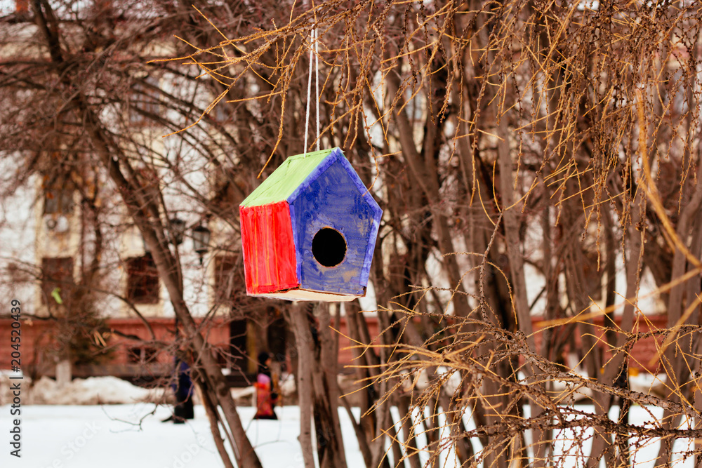 colorful birdhouse in the city park colorful birdhouse in the city park