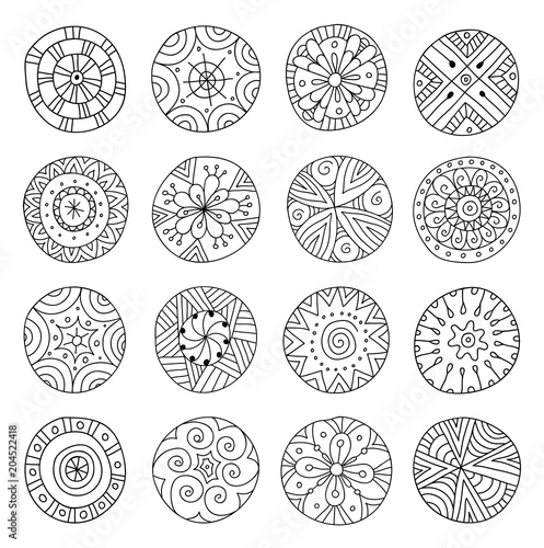 A set of doodle mandalas. Hand-drawn round decorative elements in ethnic style. Vector illustration.