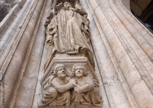 Old columns with Gothic allegorical figures of 15th century Town Hall, UNESCO World Heritage Site photo