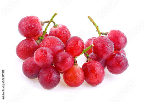 red grapes with water drops isolated on white background