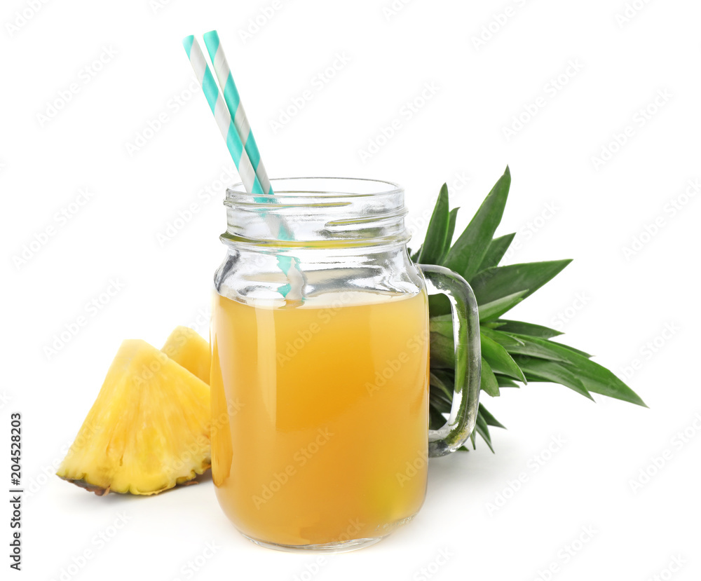 Mason jar with delicious pineapple juice on white background Mason jar with delicious pineapple juice on white background