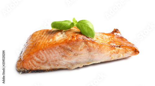 Tasty freshly cooked salmon on white background