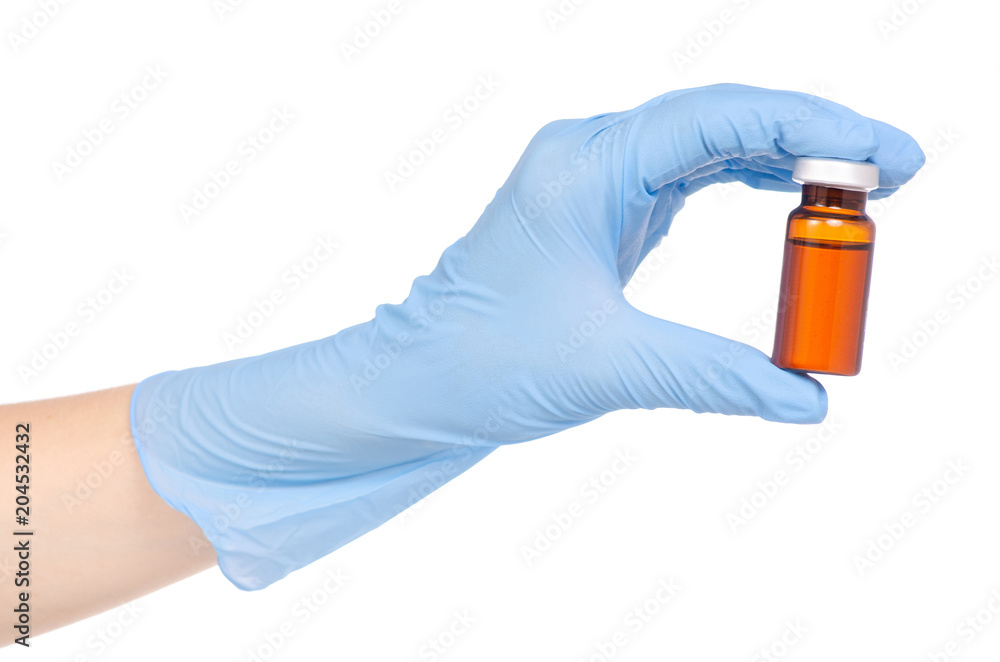 The medical ampoule in hand medical gloves The medical ampoule in hand medical gloves