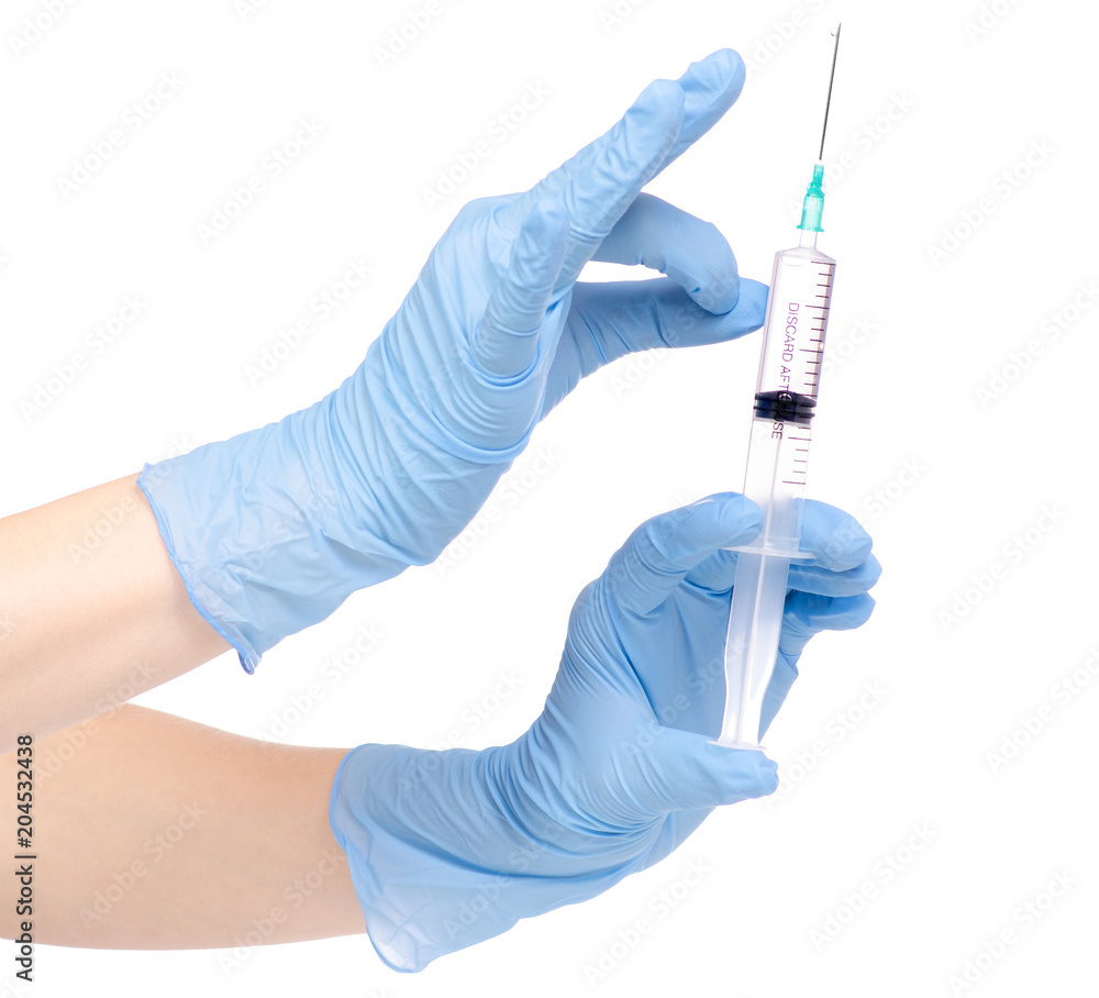 Syringe and medical ampoule in hand medical gloves Syringe and medical ampoule in hand medical gloves