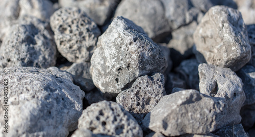 Stone crushed stone on the construction site as an abstract background