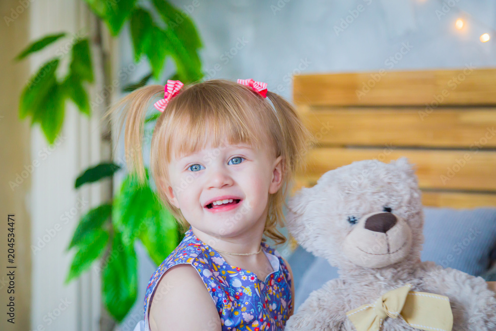 Portrait of funny little girl at home. Family, childhood and leisure concept Portrait of funny little girl at home. Family, childhood and leisure concept