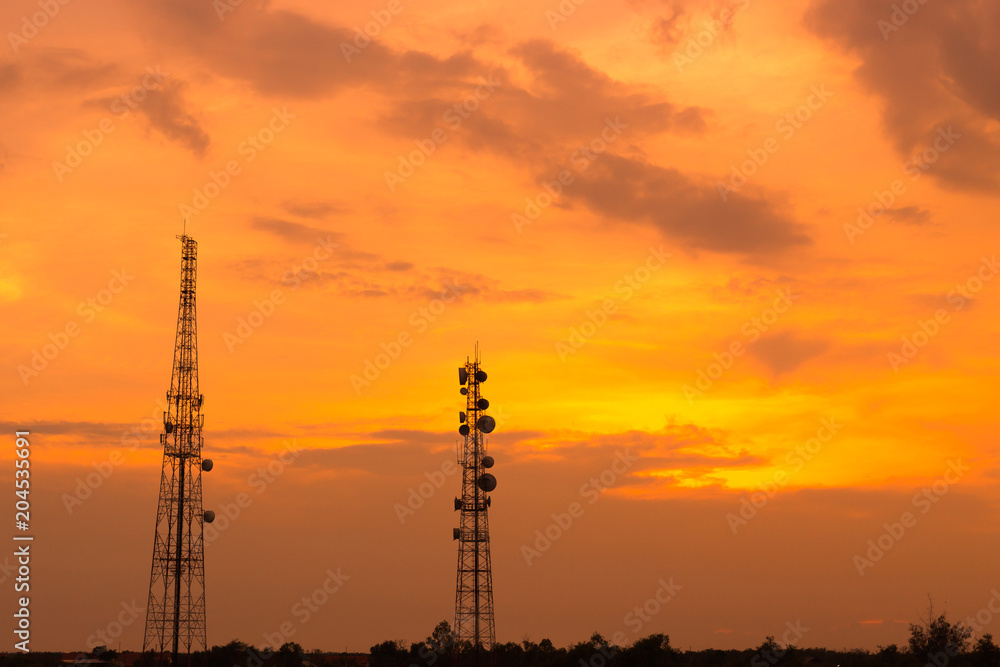 Fototapeta premium communication tower or 3G 4G WiFi network telephone cell site with sunset background with space for text