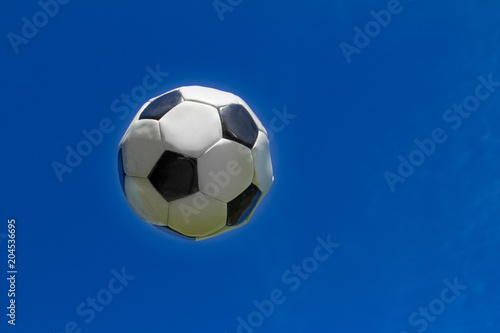football ball is flying in the sky
