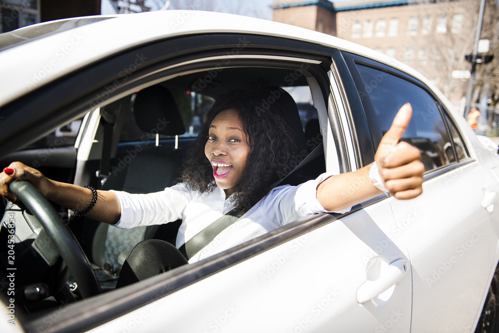 Black Business woman on a white car