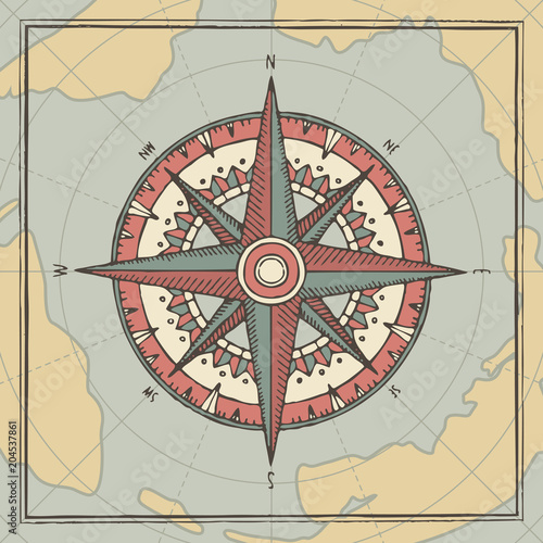 Hand-drawn vector banner with a wind rose and old nautical compass in retro style. Illustration on the theme of travel and discovery on the background of old map