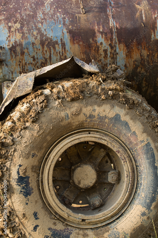 Muddy wheels of the big truck.