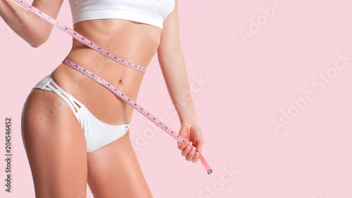 Successful weight loss, beautiful female waist, diet concept