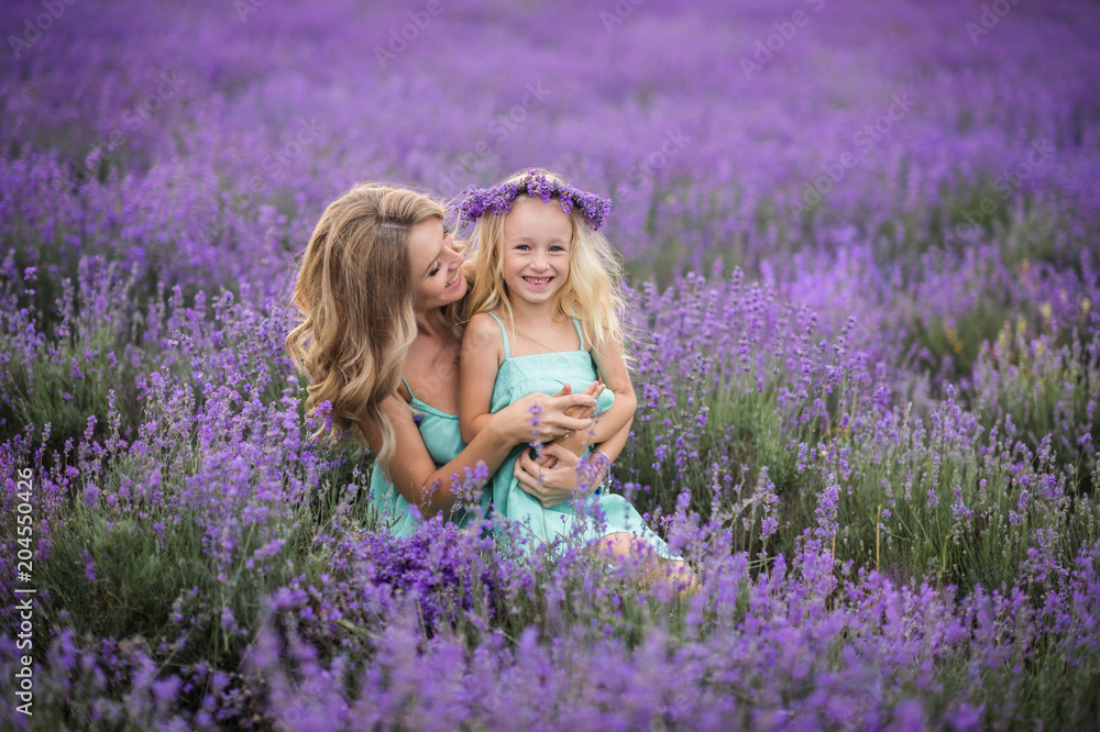 Happy family in a field of lavender Happy family in a field of lavender